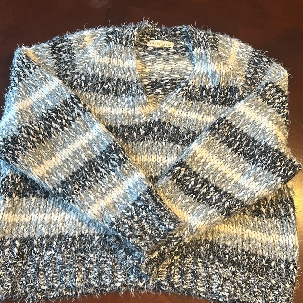 Cozy woman’s white and grey stripped sweater in M/L from Lovestitch